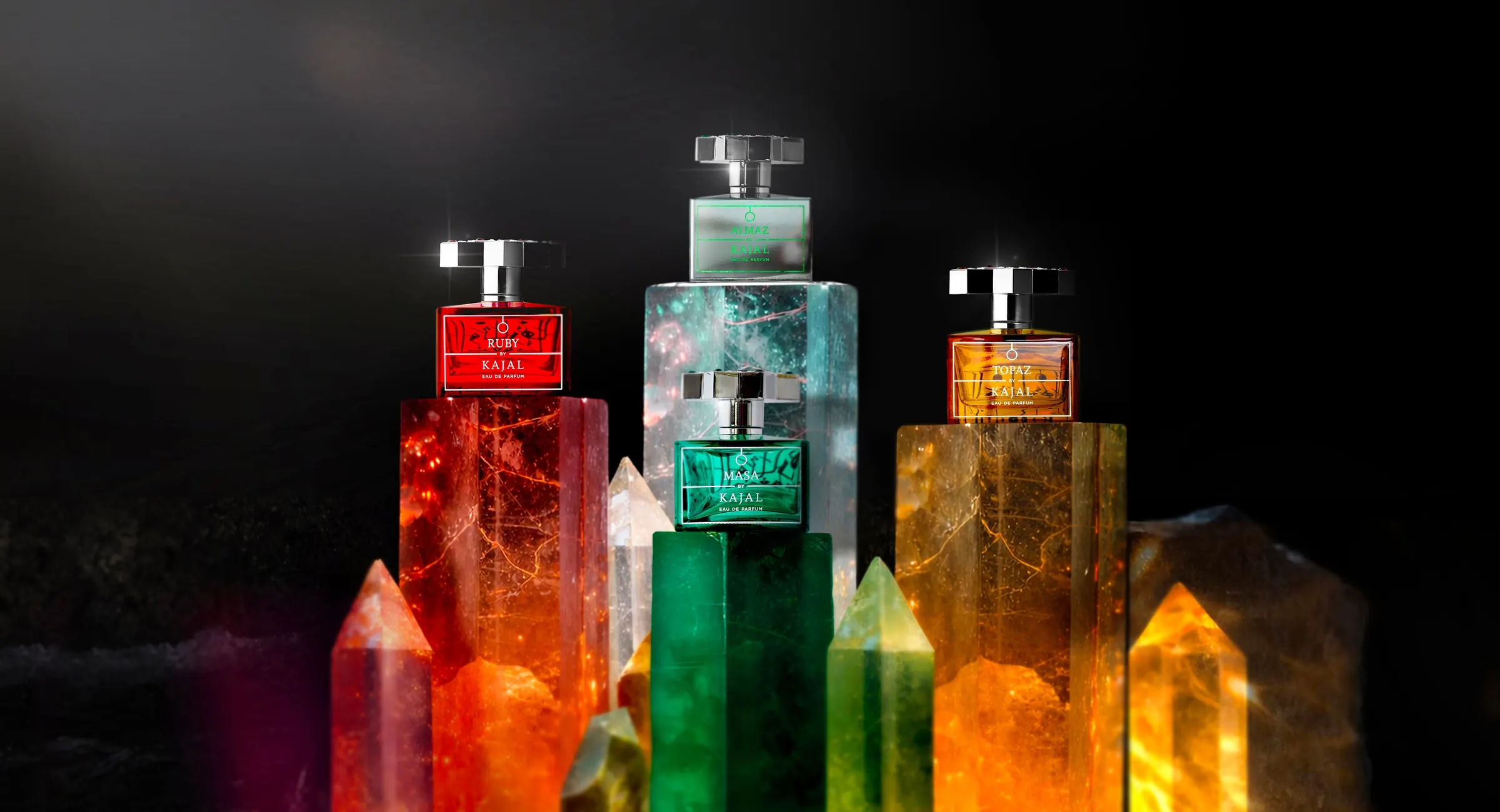 Kajal Perfumes Paris flacons among coloured crystals